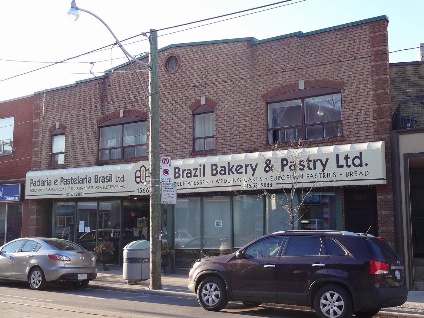 A bakery on the ground floor of a brick building
